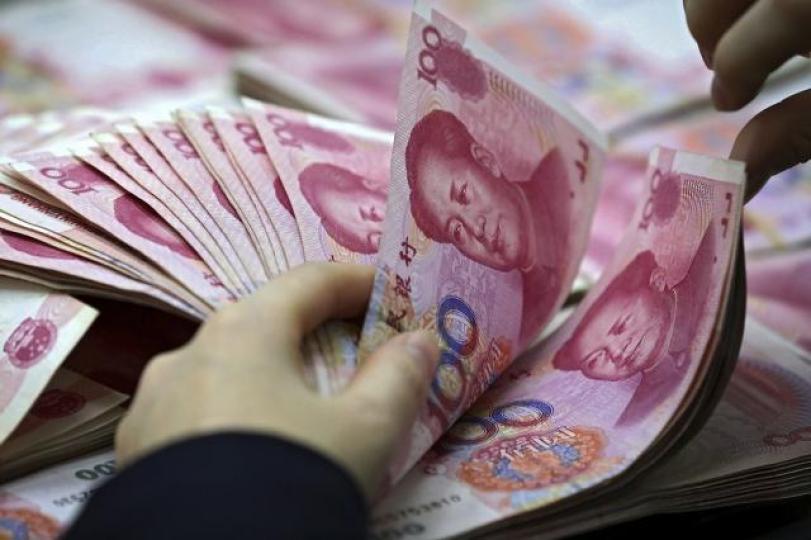 外媒指中國減持美債與穩定人民幣匯率有關。資料圖片 外媒指中國減持美債與穩定人民幣匯率有關。資料圖片