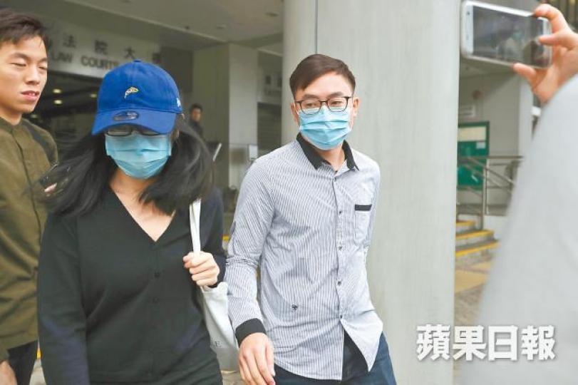 被告譚浩傑（右）與其妻胡嘉朗（左）涉用虛假工作證明申請白居二。圖為涉案東旭苑