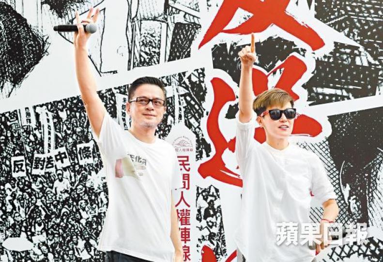 導演張堅庭昨日上街，直指送中例一旦通過香港經濟會變差。黃家慧攝
