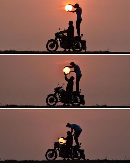 踮起腳伸手把夕陽收進機車車廂...